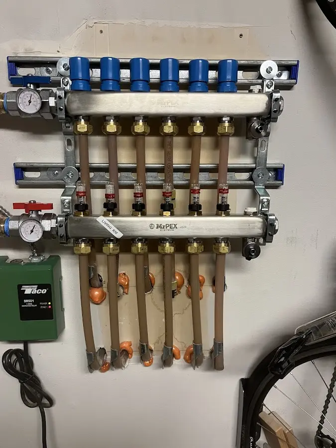 Plumber performing Water Heater Repair at a residential property in Fort Hunt